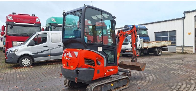 2014 Kubota KX018-4 mini excavator, rear three-quarter view 2014 Kubota KX018-4 mini excavator, rear three-quarter view