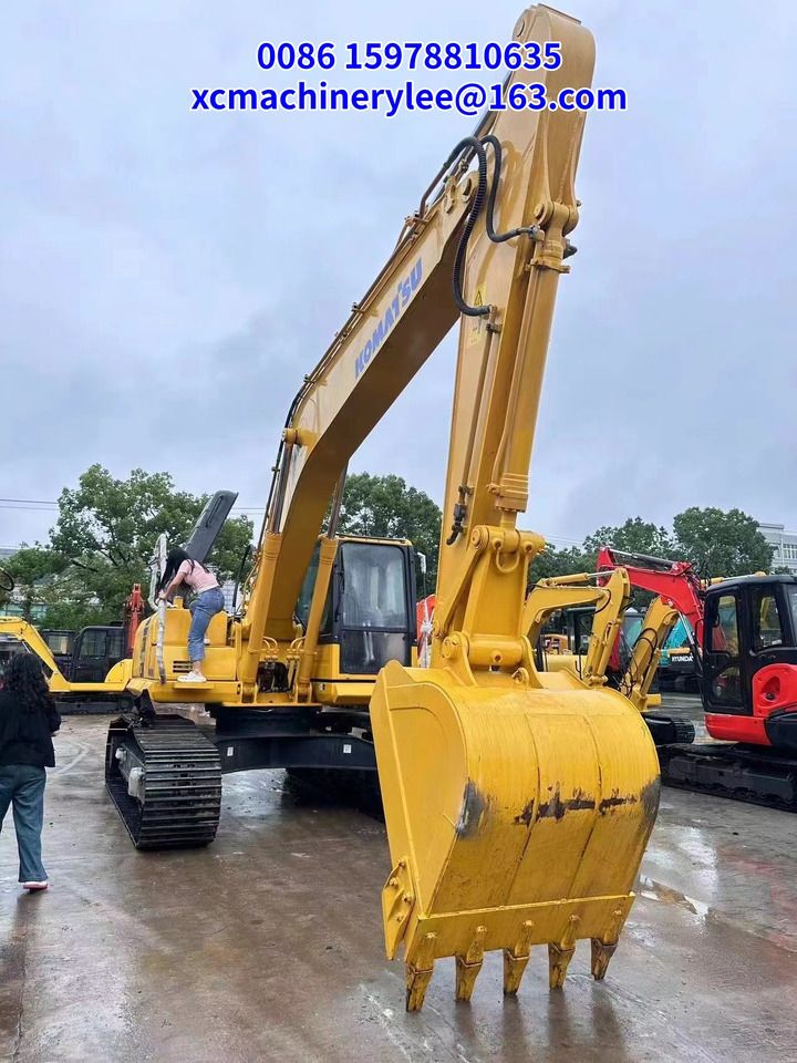 2023 Komatsu PC210 crawler excavator, front three-quarter view 2023 Komatsu PC210 crawler excavator, front three-quarter view