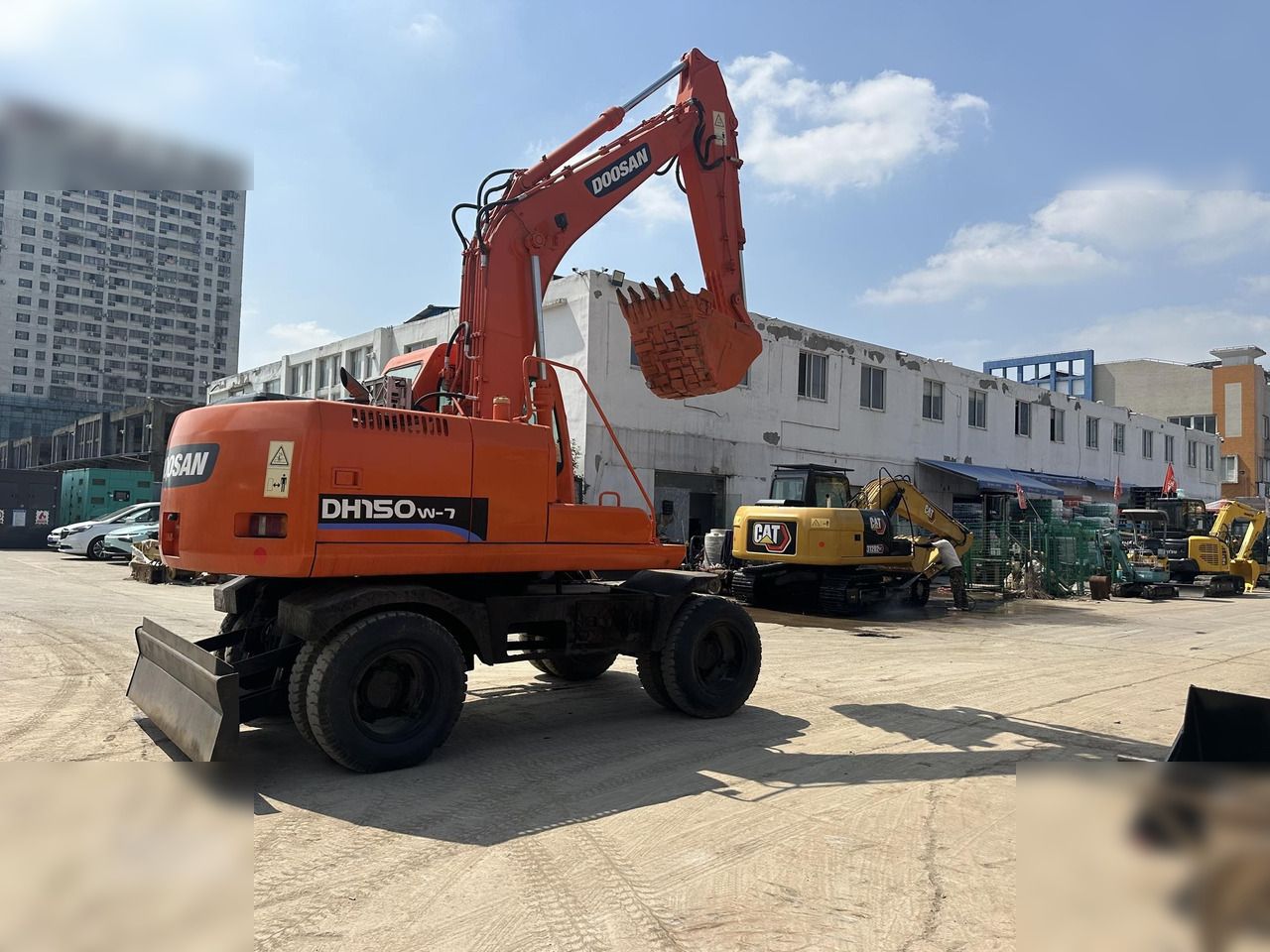 2016 Doosan DH150W-7 wheel excavator, rear three-quarter view