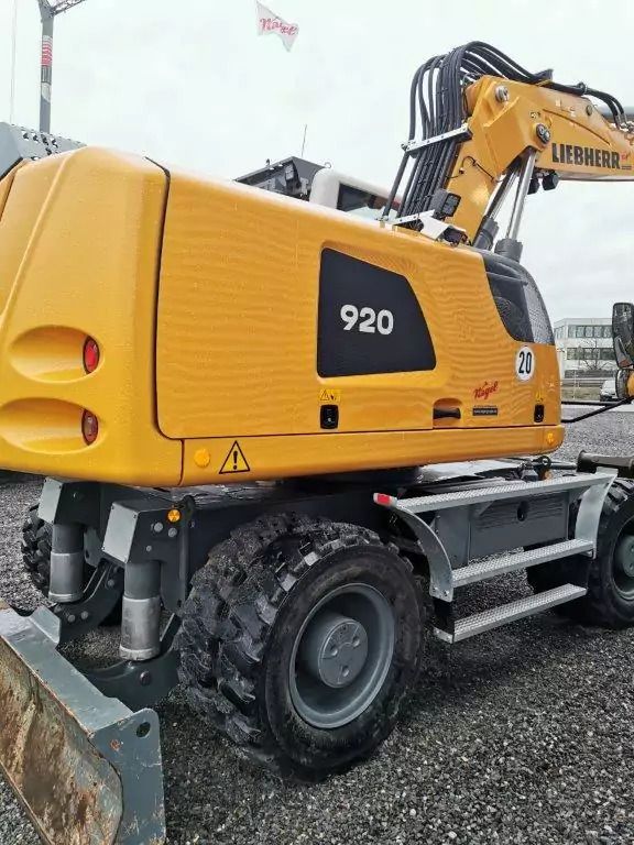 2023 Liebherr 920 Litronic wheeled excavator rear three-quarter view