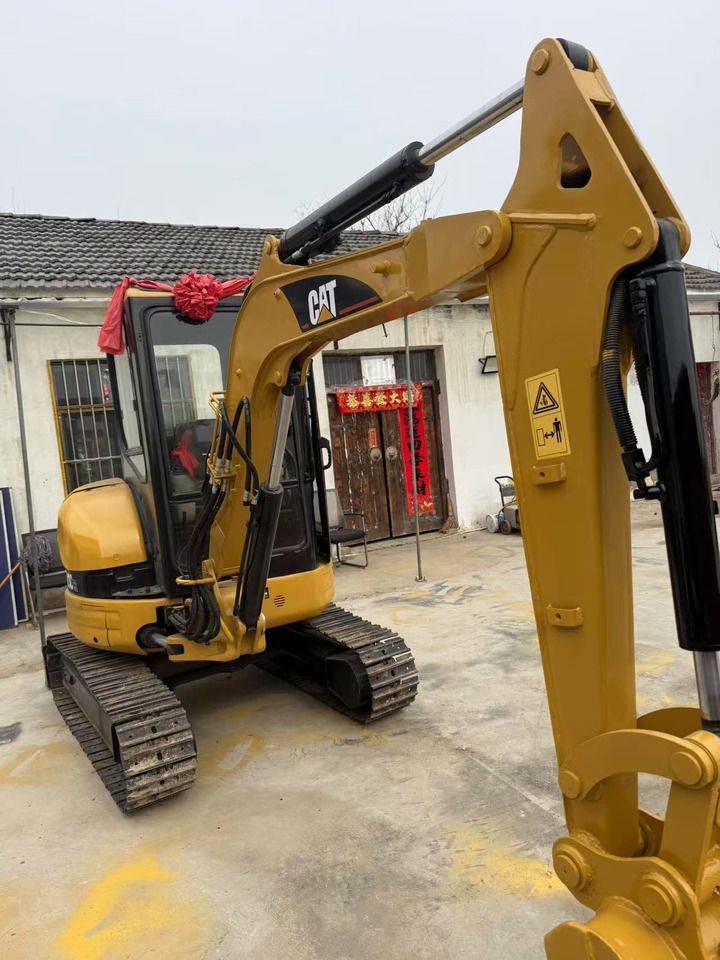 2023 Caterpillar 303CR mini excavator, front three-quarter view 2023 Caterpillar 303CR mini excavator, front three-quarter view