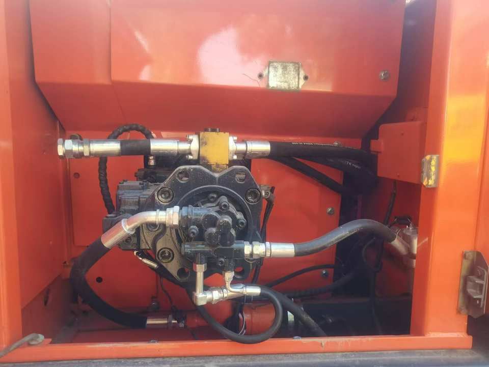 2022 Doosan DX225 crawler excavator hydraulic pump compartment view