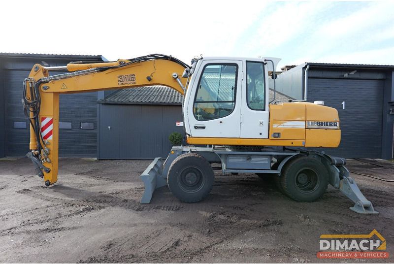 2005 Liebherr A316 wheeled excavator side view 2005 Liebherr A316 wheeled excavator side view