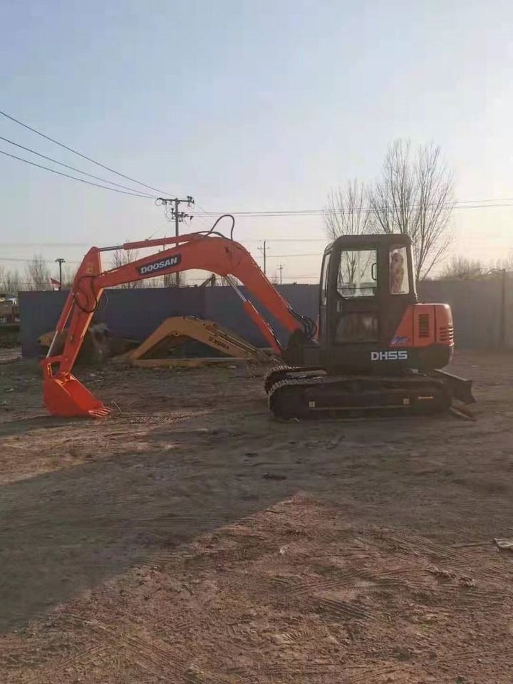 2023 Doosan DH55 mini excavator, side profile view