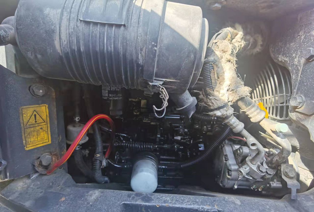 2018 Komatsu PC55MR-2 mini excavator engine compartment view 2018 Komatsu PC55MR-2 mini excavator engine compartment view