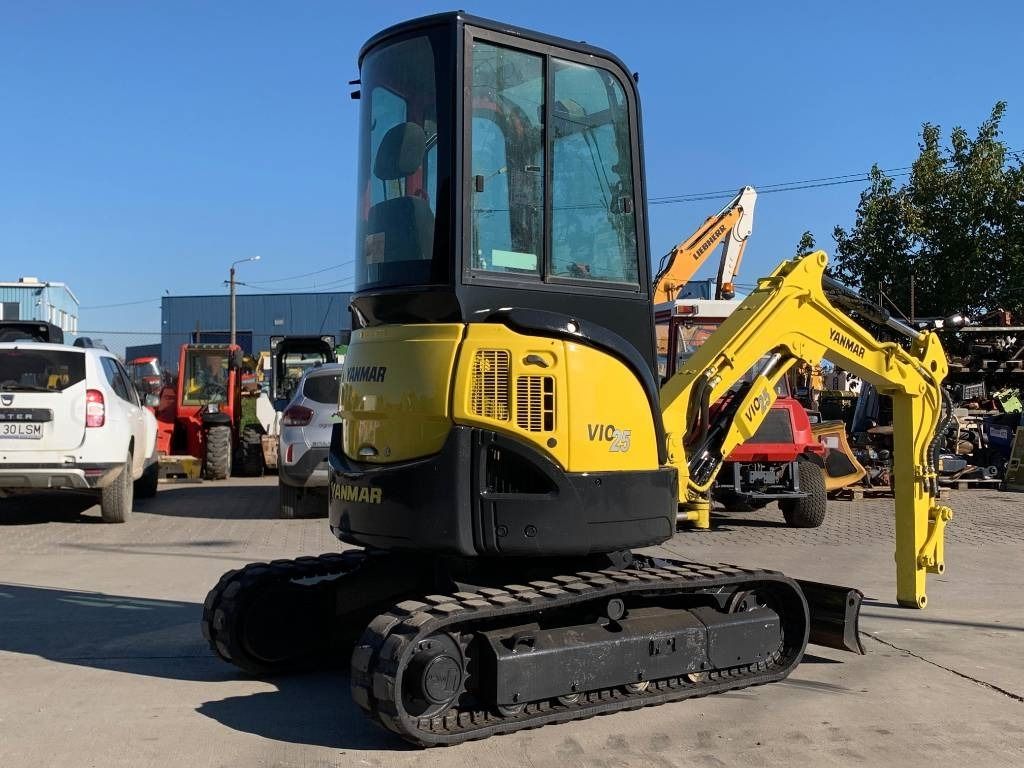 2011 Yanmar VIO25-4 mini excavator, rear three-quarter view 2011 Yanmar VIO25-4 mini excavator, rear three-quarter view