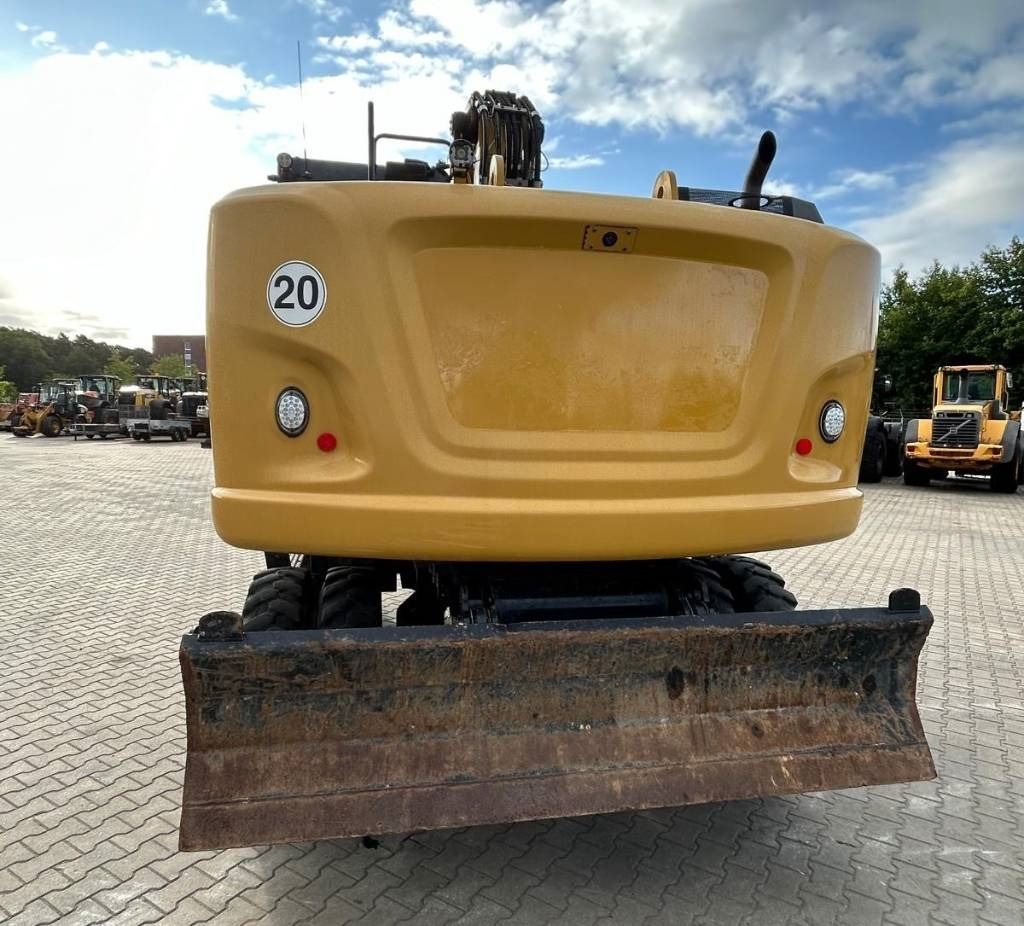 2016 Caterpillar M318F wheel excavator rear view 2016 Caterpillar M318F wheel excavator rear view