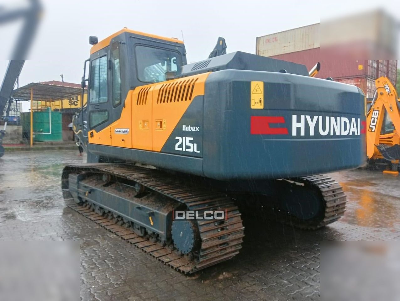 2026 Hyundai Robex 215L crawler excavator, rear three-quarter view 2026 Hyundai Robex 215L crawler excavator, rear three-quarter view