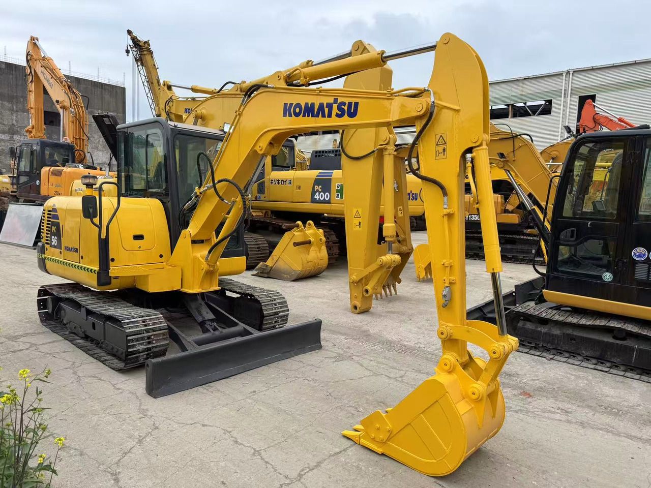 2020 Komatsu PC56 mini excavator, front three-quarter view