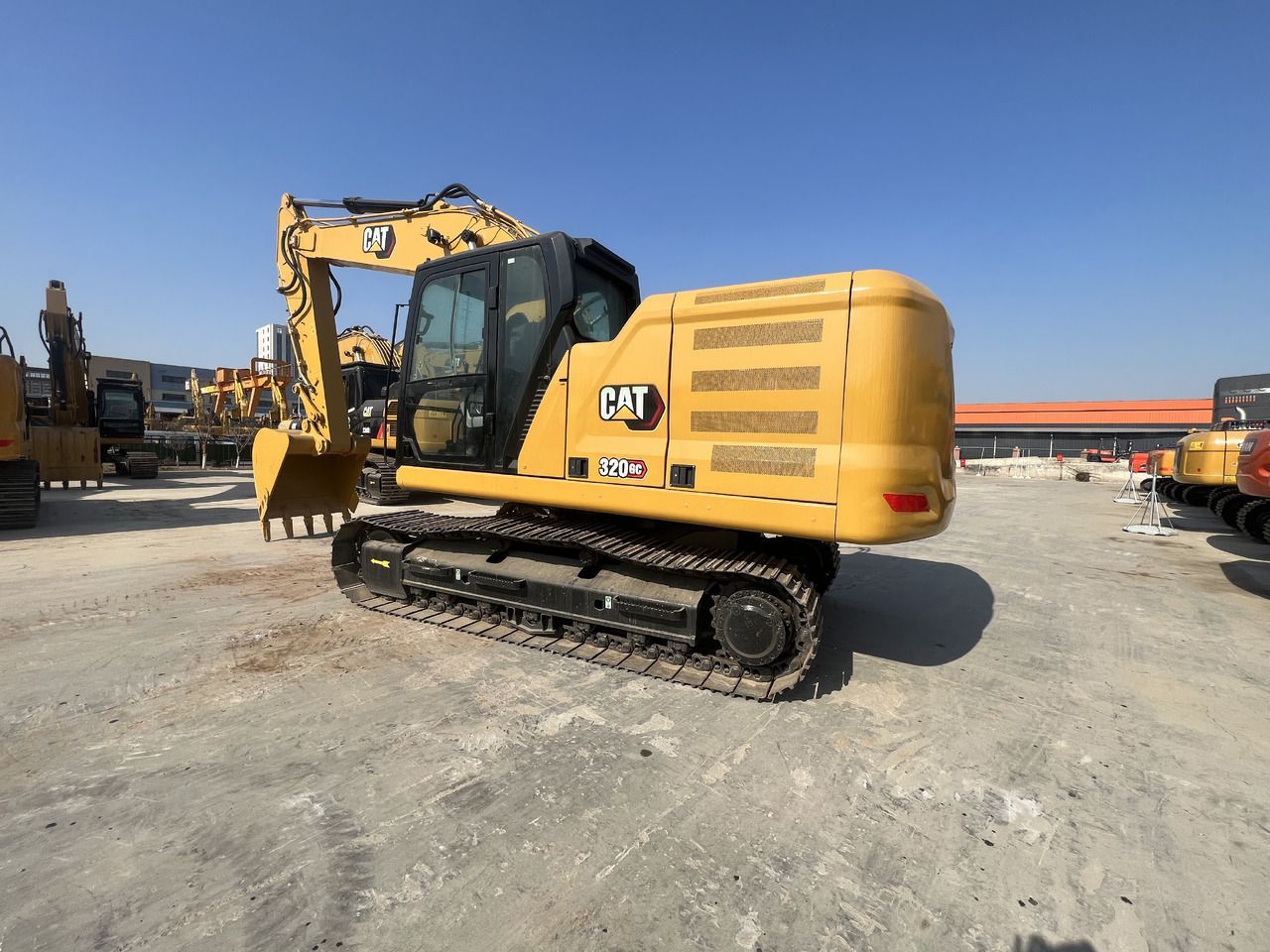 2024 Caterpillar 320GC crawler excavator, rear three-quarter view 2024 Caterpillar 320GC crawler excavator, rear three-quarter view