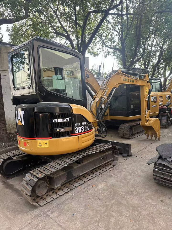 2016 Caterpillar 303CR mini excavator, rear three-quarter view 2016 Caterpillar 303CR mini excavator, rear three-quarter view