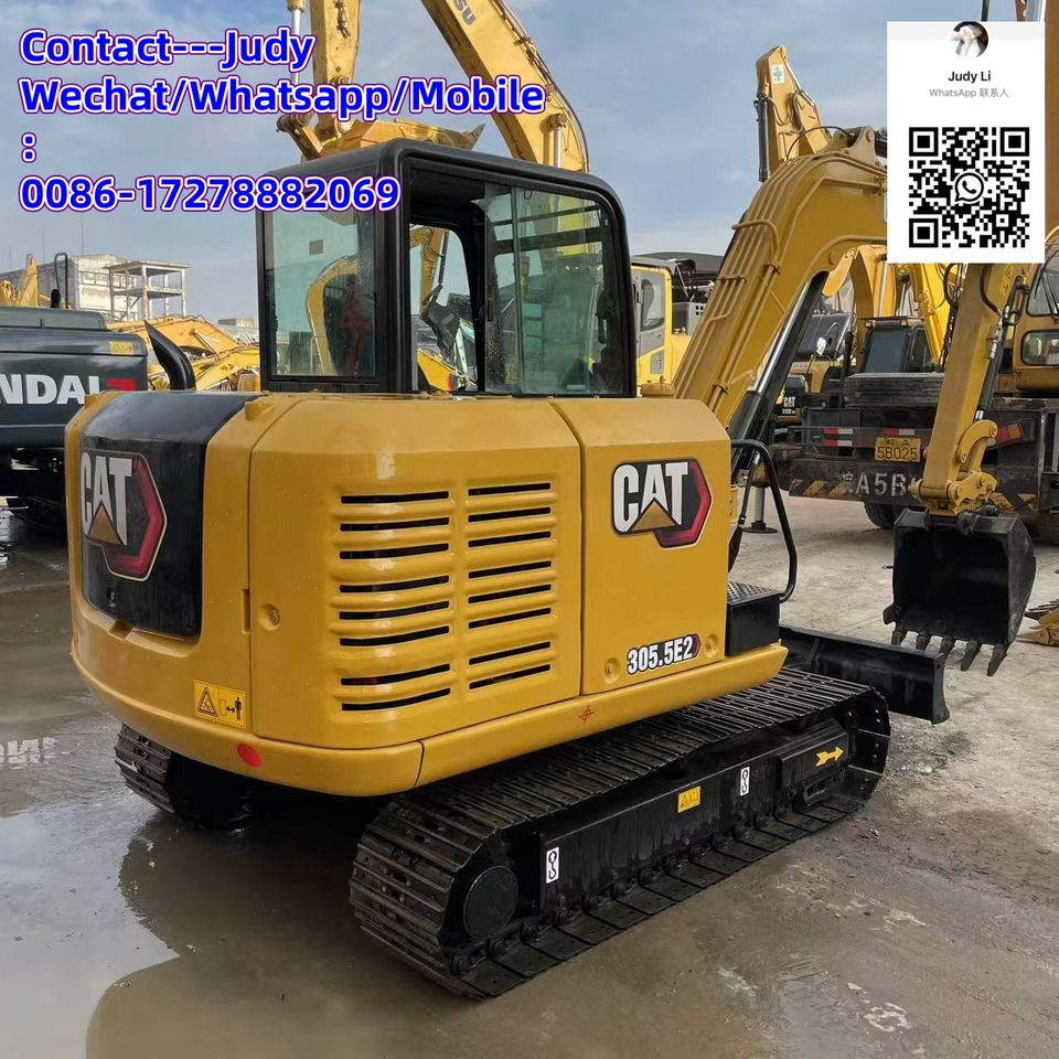 2024 Caterpillar 305.5E2 mini excavator, rear three-quarter view