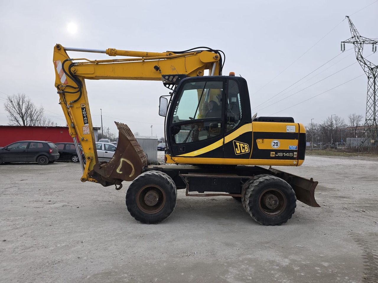 2007 JCB JS145W wheel excavator, side view 2007 JCB JS145W wheel excavator, side view