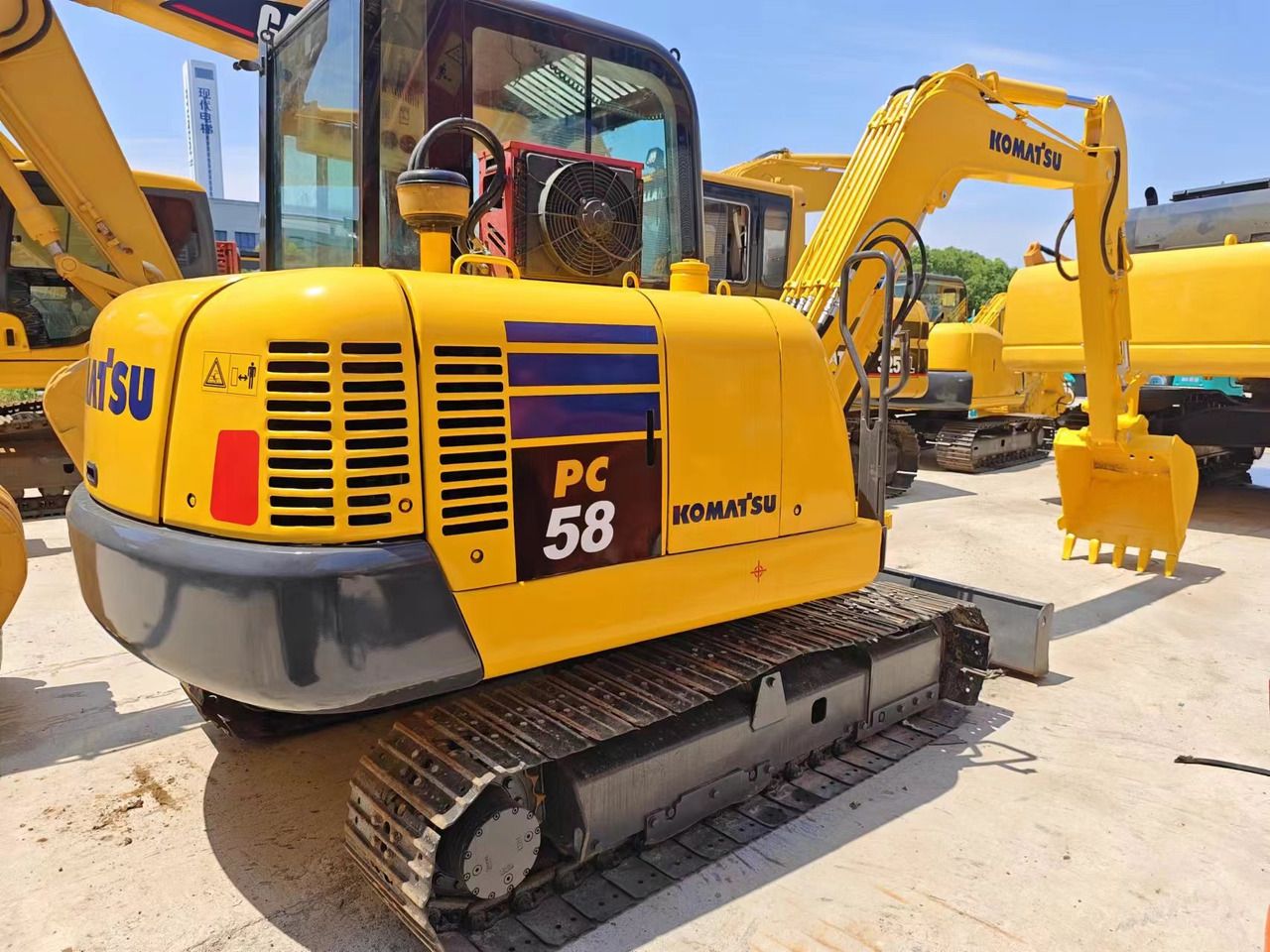 2019 Komatsu PC58 mini excavator, rear three-quarter view
