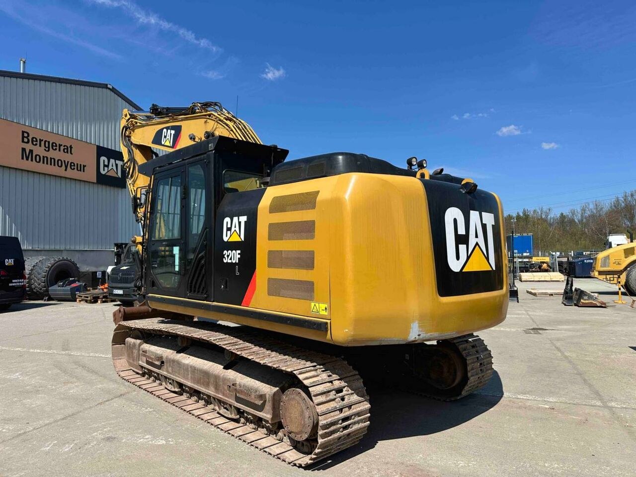 2017 Caterpillar 320FL crawler excavator, rear three-quarter view 2017 Caterpillar 320FL crawler excavator, rear three-quarter view