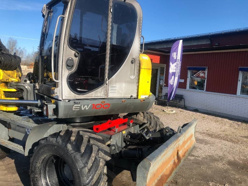 2016 Wacker Neuson EW100 wheel excavator side view 2016 Wacker Neuson EW100 wheel excavator side view