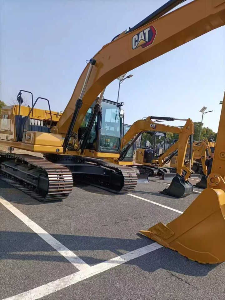 2022 Caterpillar 320GC crawler excavator, side view