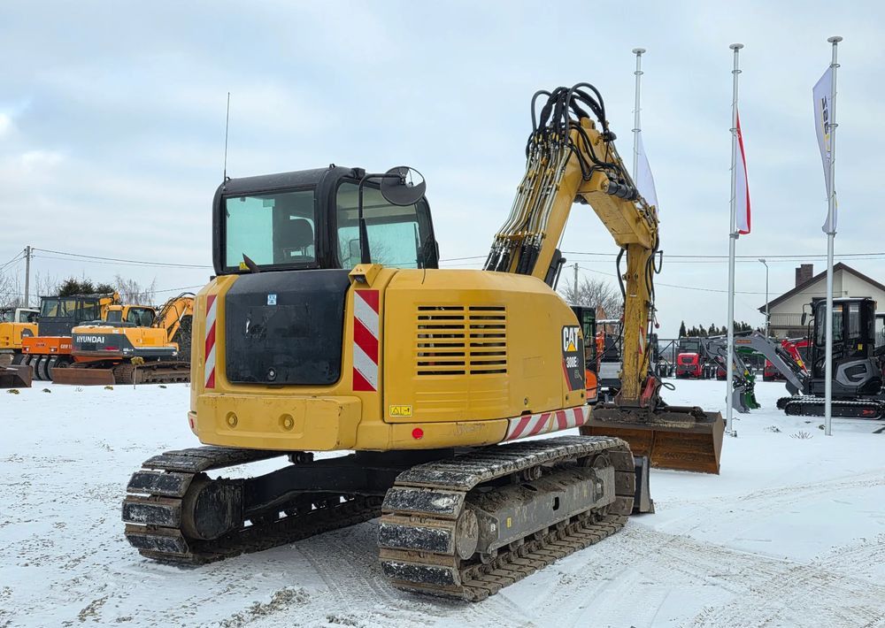 2016 Caterpillar 308E2CR crawler excavator, rear three-quarter view 2016 Caterpillar 308E2CR crawler excavator, rear three-quarter view