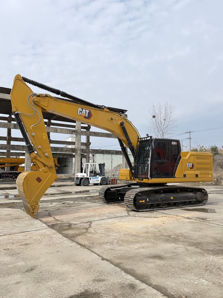 2023 Caterpillar 330GC crawler excavator, side profile view
