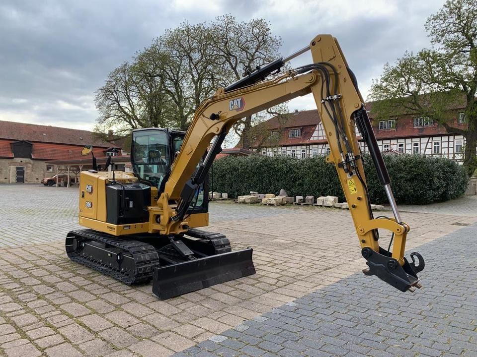 Caterpillar 306CR-07A Mini Excavator, rear three-quarter view Caterpillar 306CR-07A Mini Excavator, rear three-quarter view