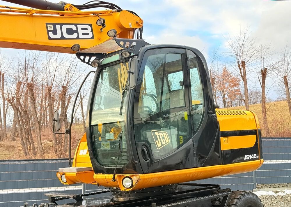 2011 JCB JS145W wheel excavator cab and boom view