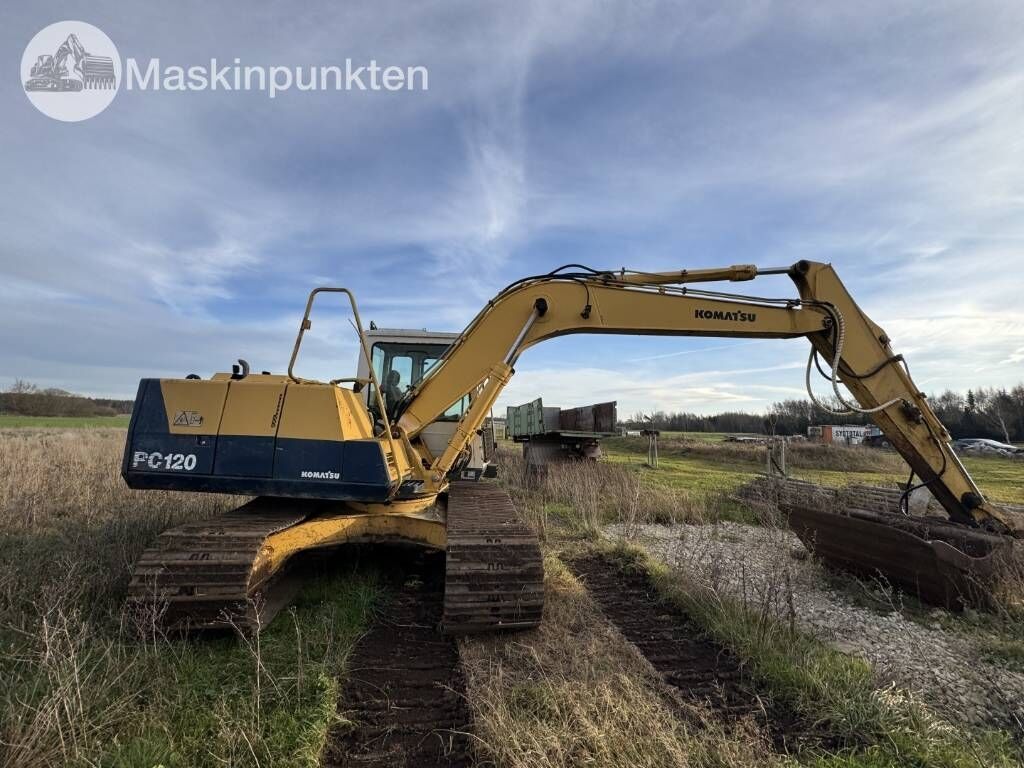 1995 Komatsu PC120-5 crawler excavator, rear three-quarter view 1995 Komatsu PC120-5 crawler excavator, rear three-quarter view