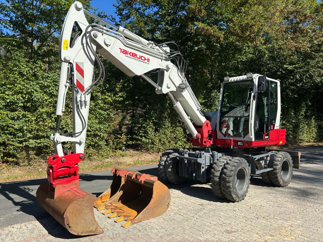 2015 Takeuchi TB295W wheel excavator side view