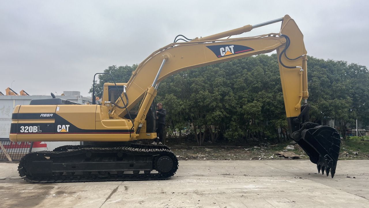 2019 Caterpillar 320BL crawler excavator, side profile view