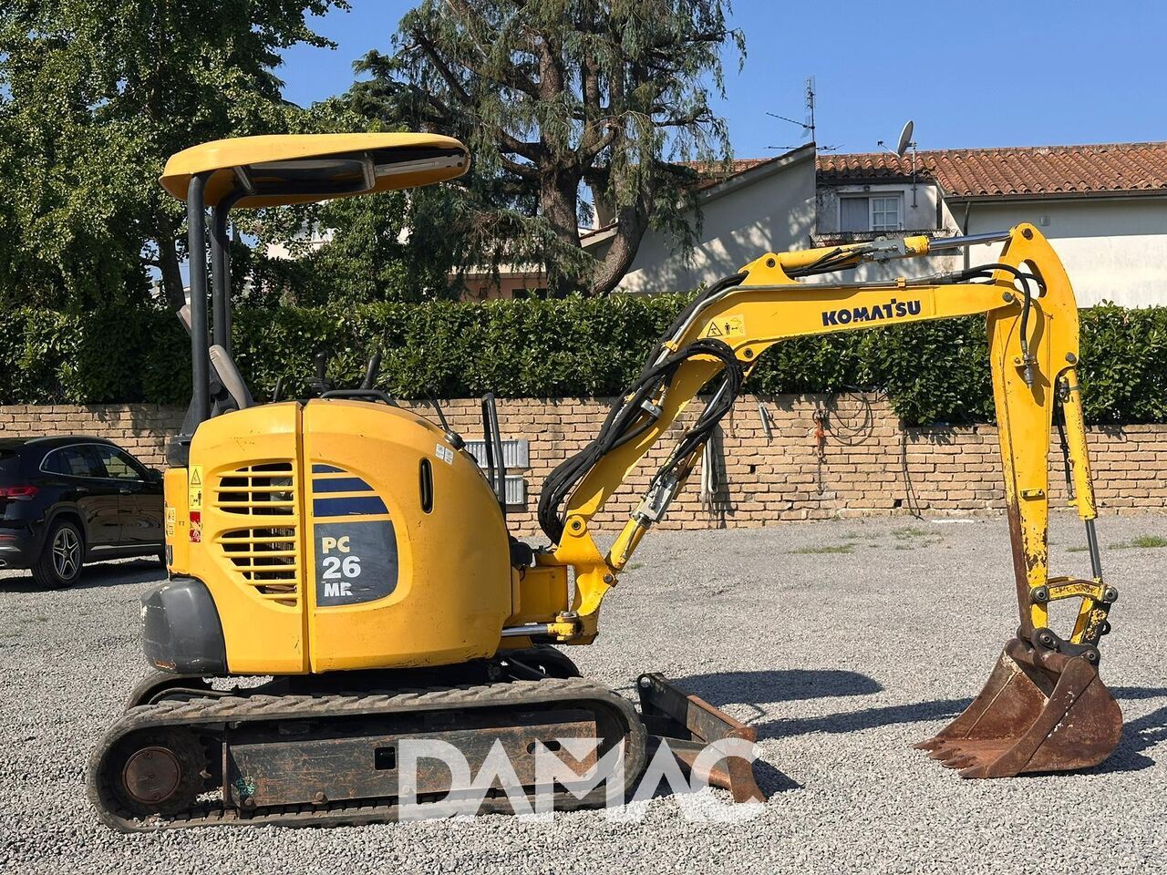 2014 Komatsu PC26MR-3 mini excavator side view