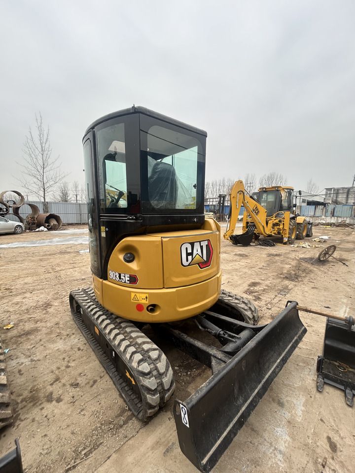 2019 Caterpillar 303.5E mini excavator, rear three-quarter view 2019 Caterpillar 303.5E mini excavator, rear three-quarter view