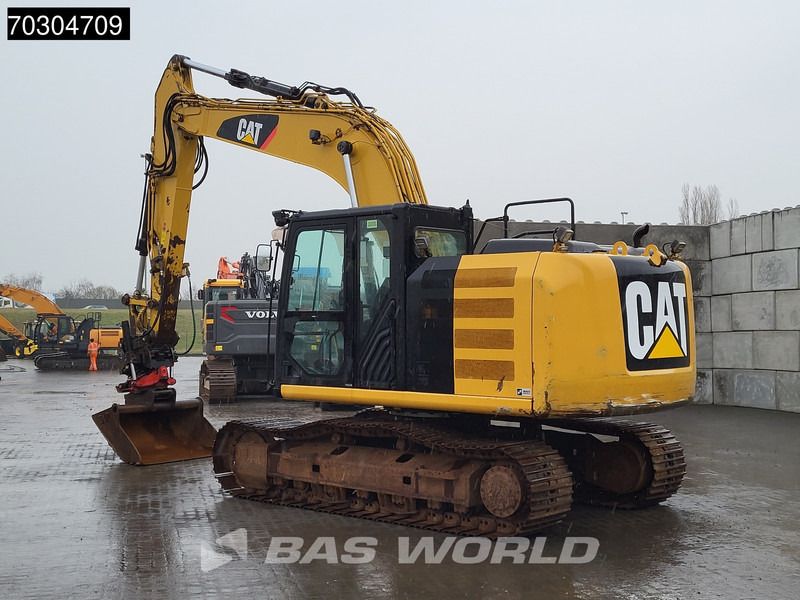 2015 Caterpillar 318EL crawler excavator, rear three-quarter view