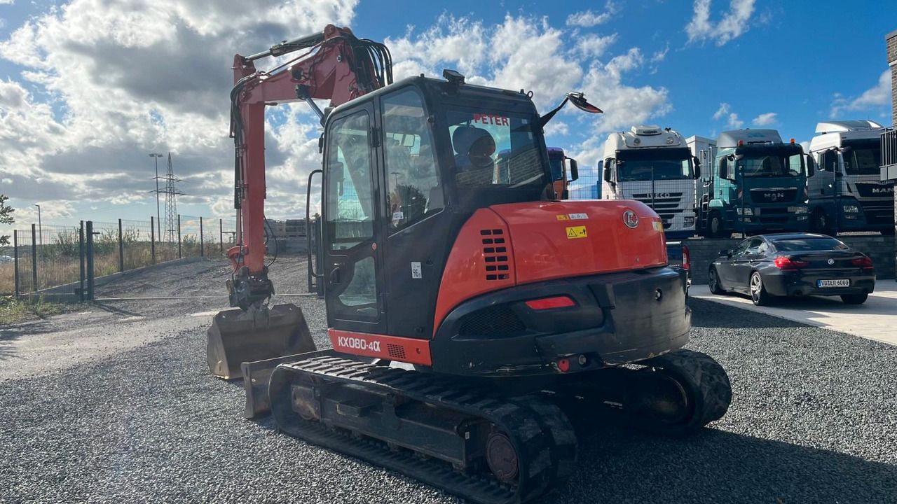 2019 Kubota KX080-4A mini excavator, three-quarter front view 2019 Kubota KX080-4A mini excavator, three-quarter front view