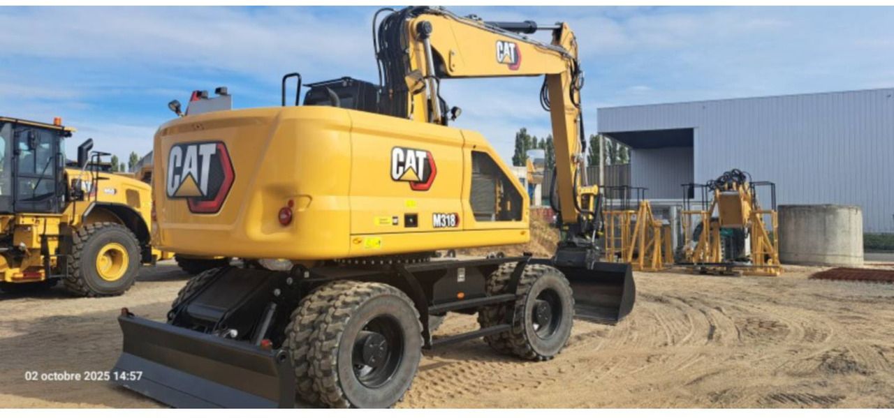 2024 Caterpillar M318-07 wheel excavator, rear three-quarter view 2024 Caterpillar M318-07 wheel excavator, rear three-quarter view