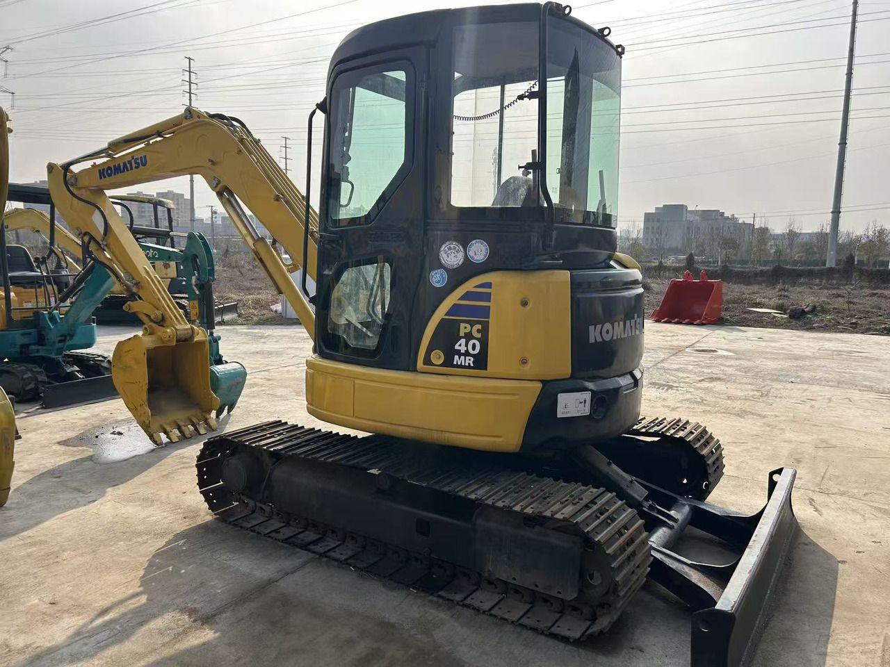 2024 Komatsu PC40 MR mini excavator, rear three-quarter view 2024 Komatsu PC40 MR mini excavator, rear three-quarter view