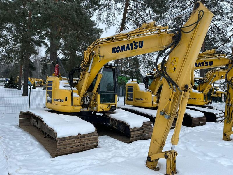 2014 Komatsu PC138US-10 crawler excavator, front three-quarter view 2014 Komatsu PC138US-10 crawler excavator, front three-quarter view