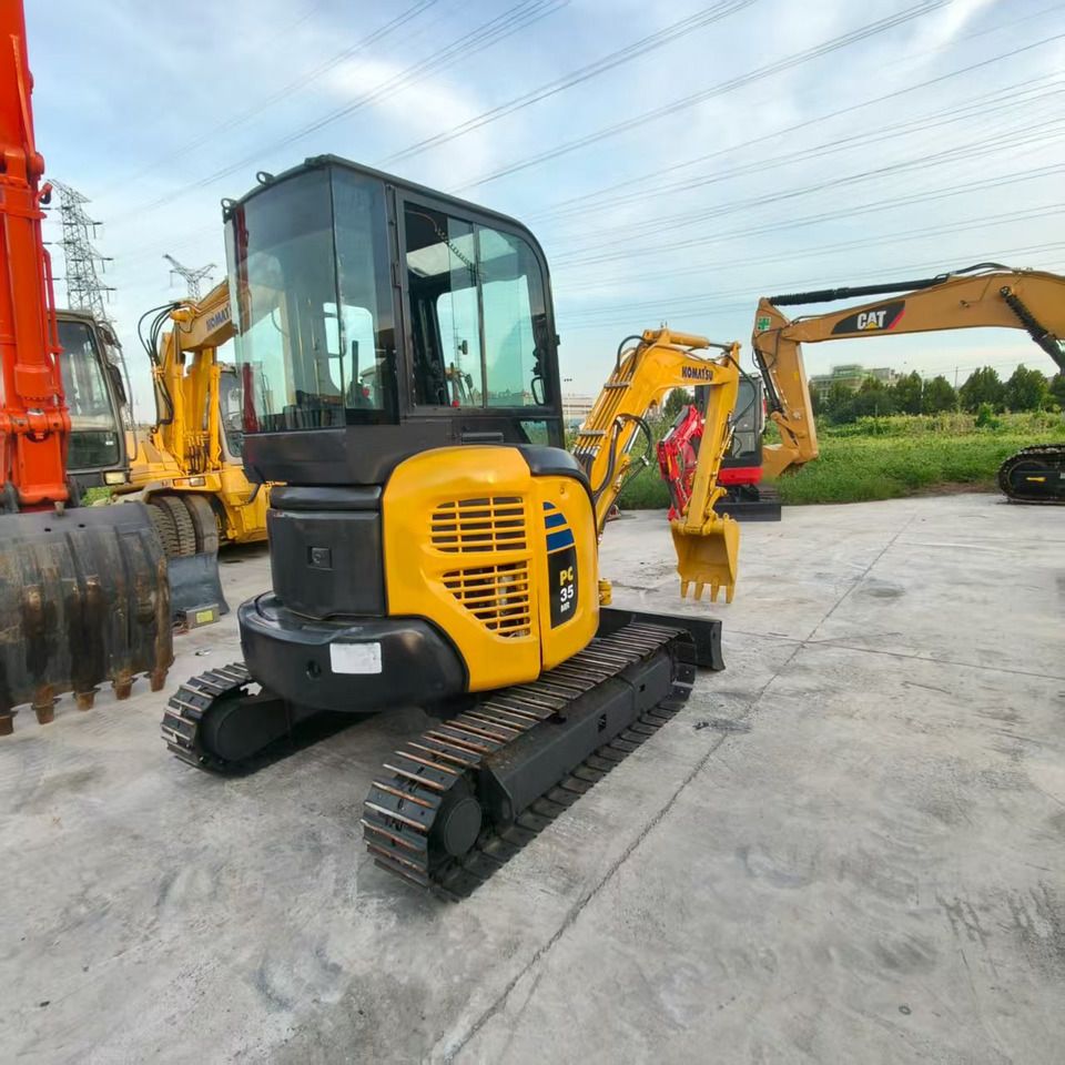 2023 Komatsu PC35MR mini excavator, rear three-quarter view 2023 Komatsu PC35MR mini excavator, rear three-quarter view