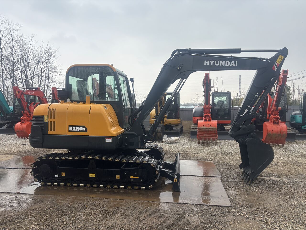 2024 Hyundai HX60N mini excavator, side view 2024 Hyundai HX60N mini excavator, side view