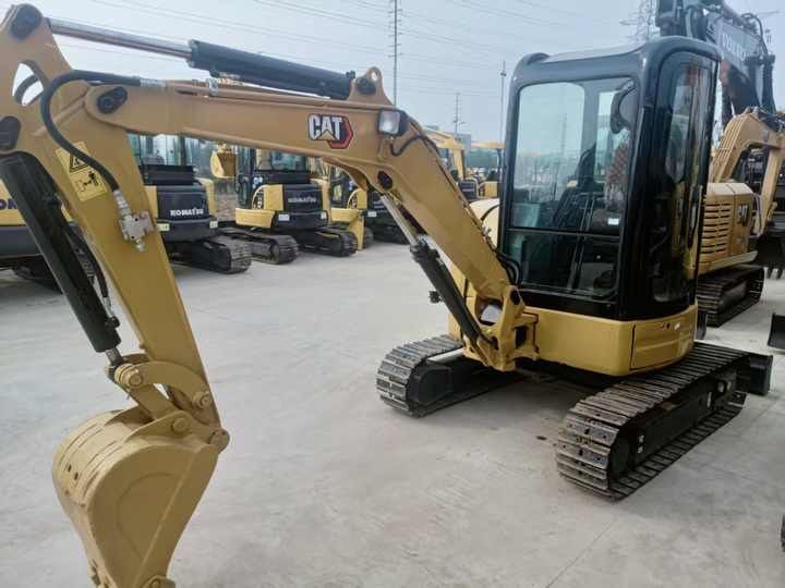 2023 Caterpillar 303.5E mini excavator, front three-quarter view