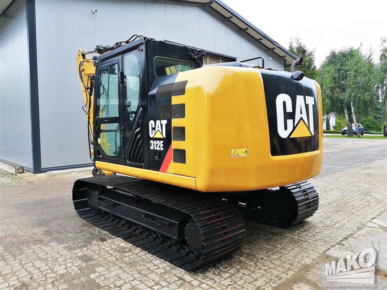 2015 Caterpillar 312E crawler excavator, rear three-quarter view 2015 Caterpillar 312E crawler excavator, rear three-quarter view