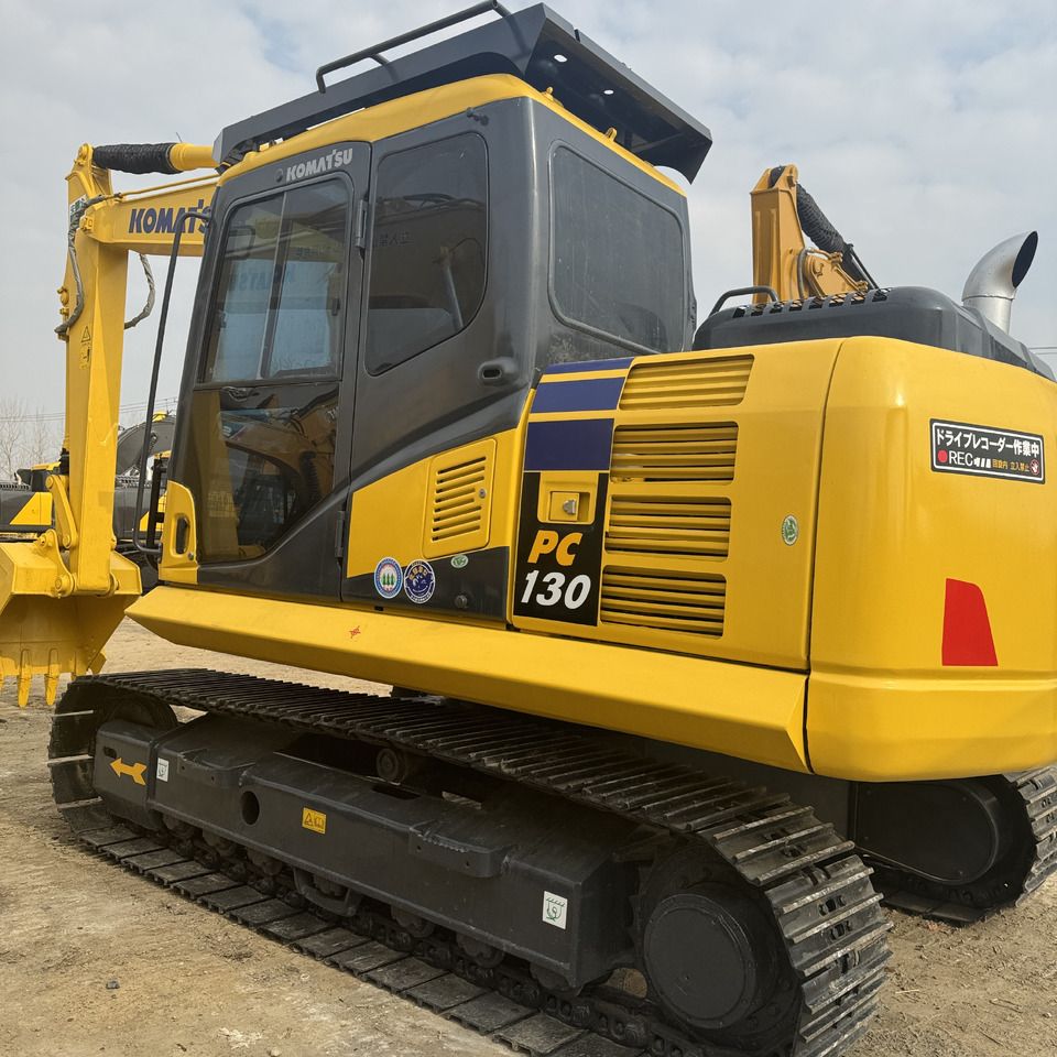2022 Komatsu PC130-7 mini excavator, rear three-quarter view 2022 Komatsu PC130-7 mini excavator, rear three-quarter view
