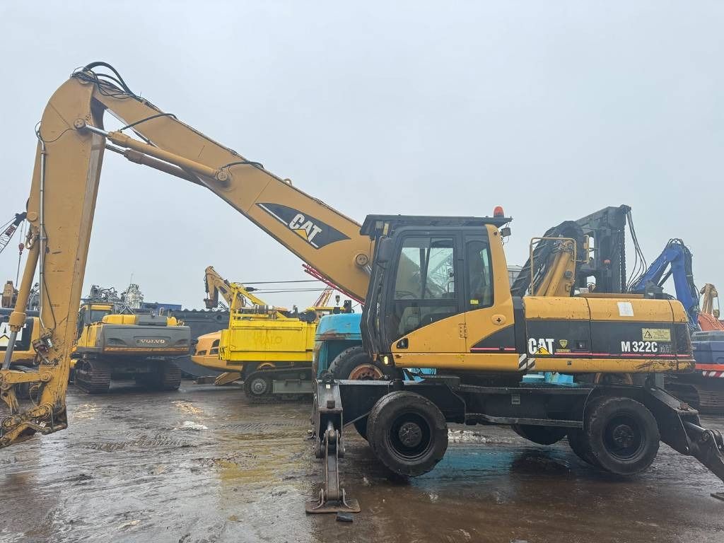 2005 Caterpillar M322C material handler, side view