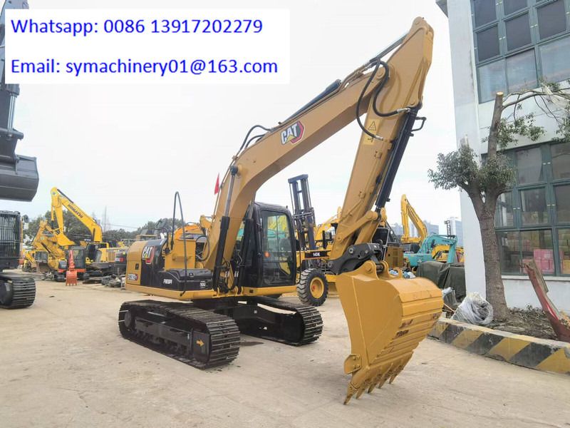 2023 Caterpillar 313D2 GC crawler excavator, side view
