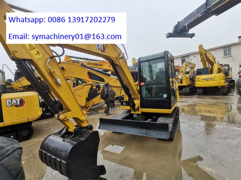 2023 Caterpillar 306E2 mini excavator front three-quarter view 2023 Caterpillar 306E2 mini excavator front three-quarter view
