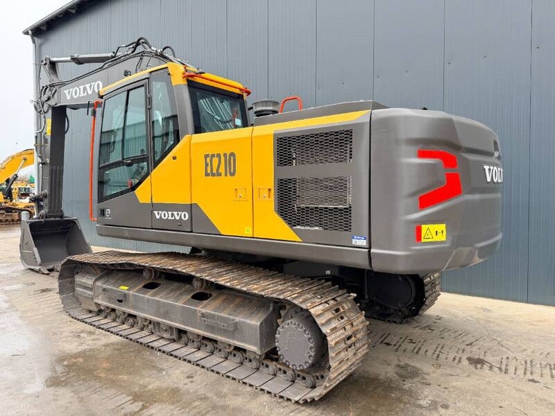 2025 Volvo EC210 crawler excavator, rear three-quarter view