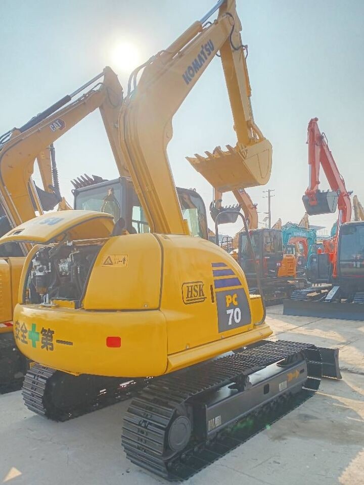 2025 Komatsu PC70 crawler excavator, rear three-quarter view