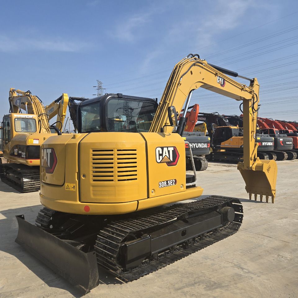 2022 Caterpillar 308.5E2 mini excavator, rear three-quarter view 2022 Caterpillar 308.5E2 mini excavator, rear three-quarter view