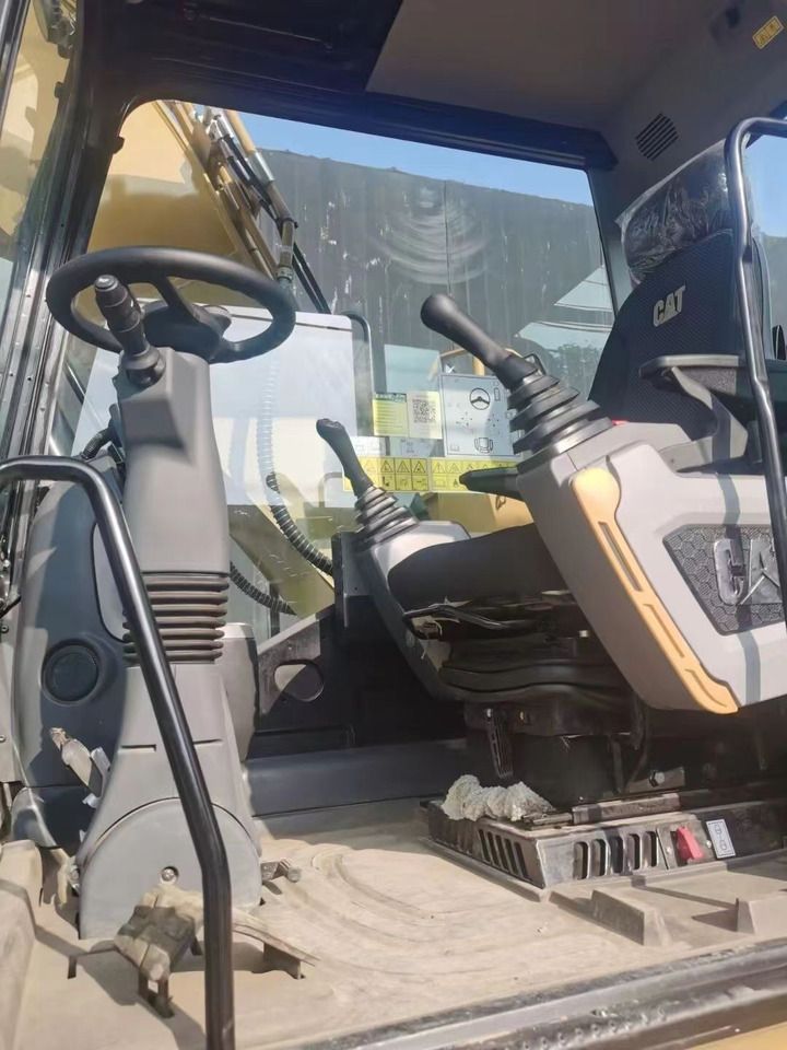 2023 Caterpillar M315GC wheel excavator interior cab view