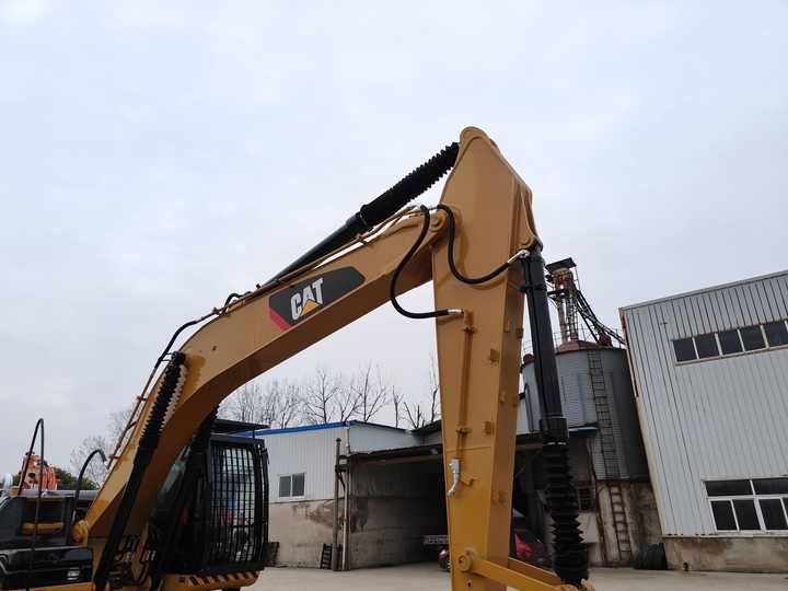 2016 Caterpillar 312D crawler excavator boom and arm detail 2016 Caterpillar 312D crawler excavator boom and arm detail