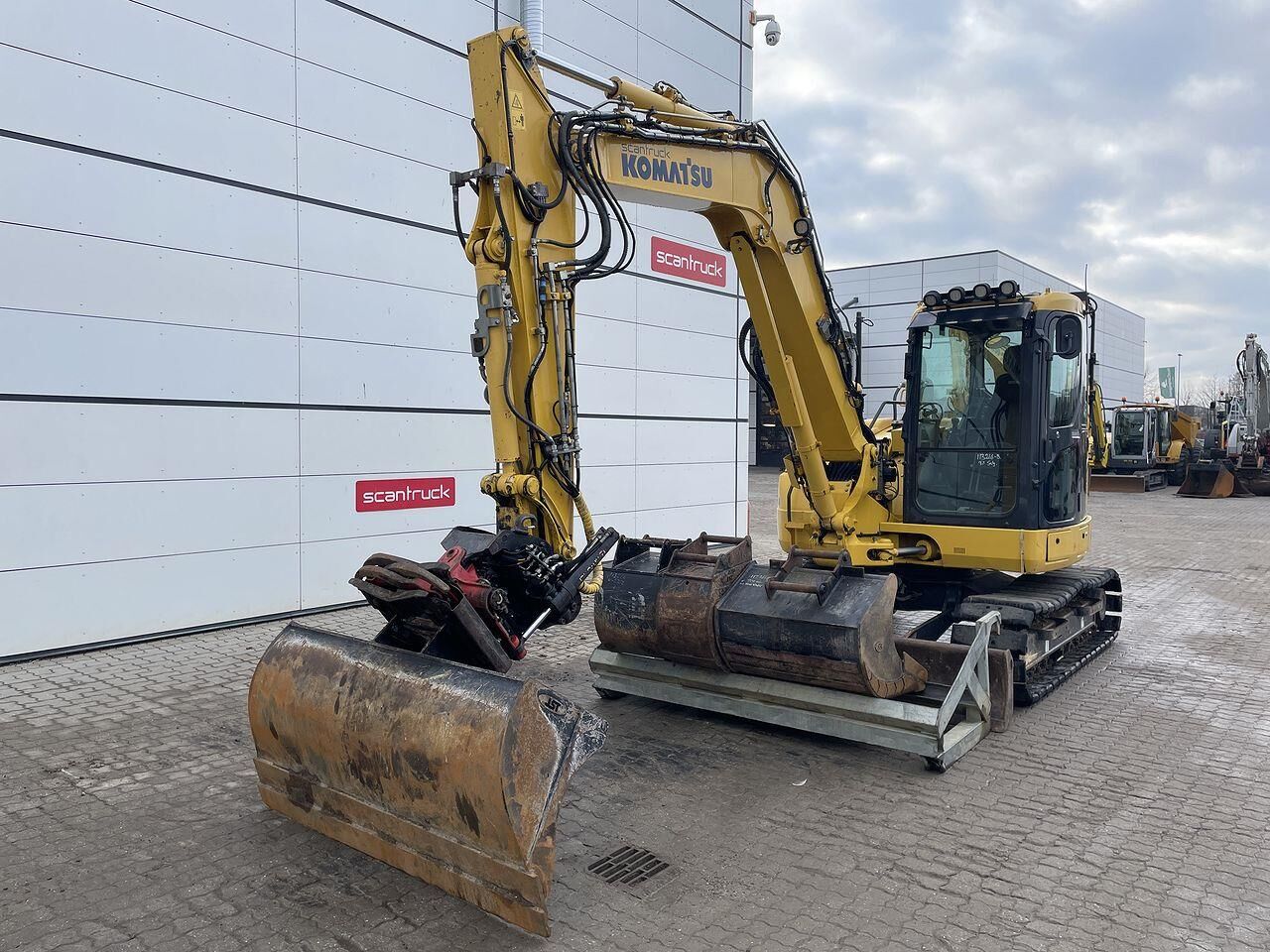 2020 Komatsu PC88MR-10 mini excavator, front three-quarter view