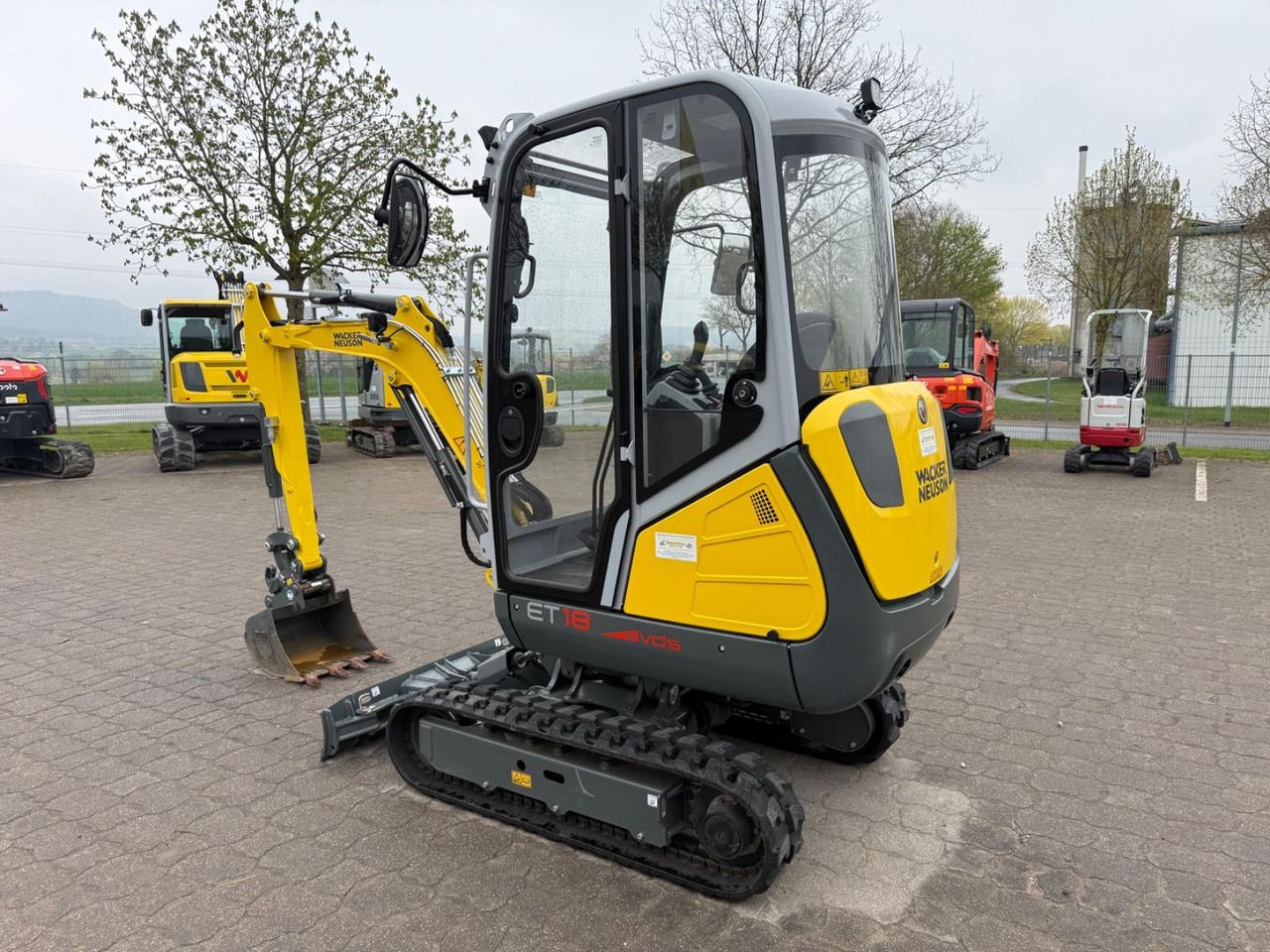 2025 Wacker Neuson ET18 mini excavator, rear three-quarter view 2025 Wacker Neuson ET18 mini excavator, rear three-quarter view